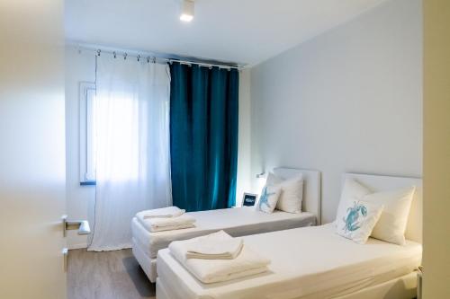 Postel nebo postele na pokoji v ubytování Italyescapes La Piazzetta