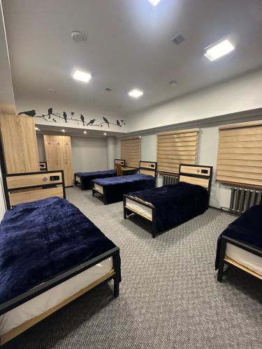 Hostel 211A tesisinde bir odada yatak veya yataklar