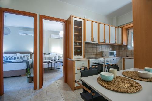 Η κουζίνα ή μικρή κουζίνα στο Elyzabeth Garden Apartment