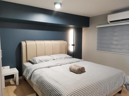 Postel nebo postele na pokoji v ubytování Cozy Loft By Hauzcinta @Sunway Grid