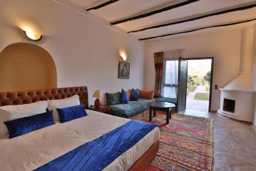 Ein Bett oder Betten in einem Zimmer der Unterkunft Ksar Shama - Atlas Mountain Escape