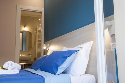 Una cama o camas en una habitación de B&B Morelli Home