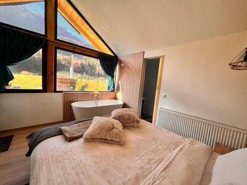 Un pat sau paturi într-o cameră la View Piatra Craiului