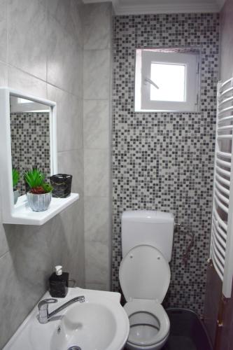 Un baño de Apartmani Lučić