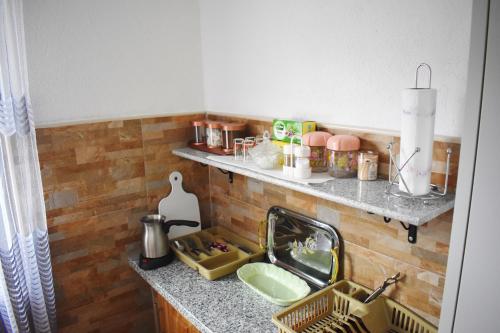 Una cocina o zona de cocina en Apartmani Lučić