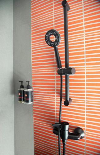 a shower with a showercussioncussioncussioncussioncussioncussioncussioncussioncussioncussioncussion at Ginger Nashik in Nashik