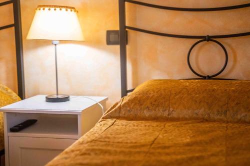 Ένα ή περισσότερα κρεβάτια σε δωμάτιο στο Agriturismo Rihane