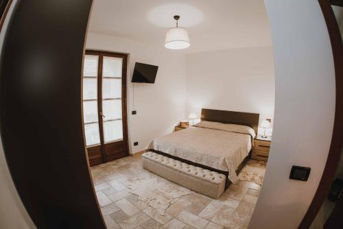 Ένα ή περισσότερα κρεβάτια σε δωμάτιο στο Agriturismo Rihane