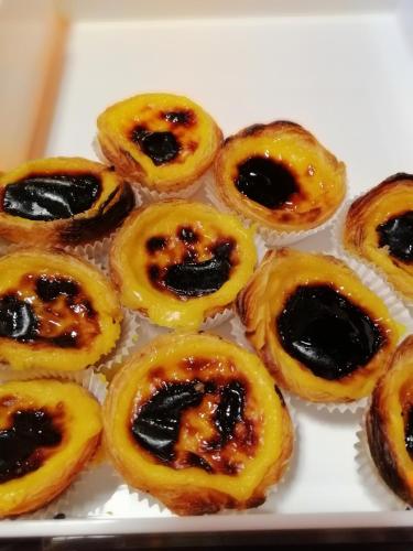 a group of small pastries on a white plate at Hotel Vianorte in Matosinhos