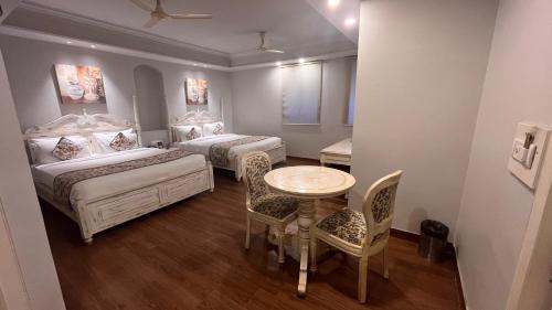 Cama o camas de una habitación en Ratnawali – A Vegetarian Heritage Hotel