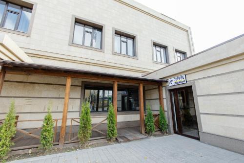 a building with the entrance to a building at 281 Hostel in Bishkek