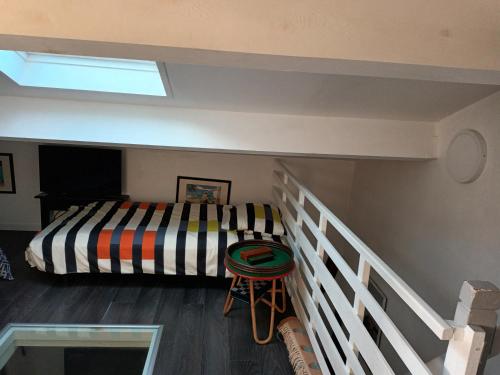 Кровать или кровати в номере La cabane du pêcheur