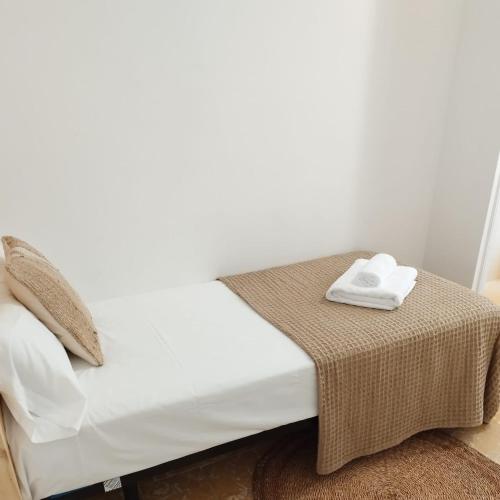Postel nebo postele na pokoji v ubytování Hostal Sa Teula