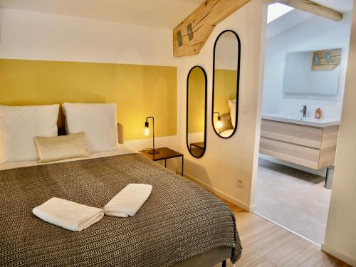 Posteľ alebo postele v izbe v ubytovaní En Vau - Coliving - Mas des Sous Bois