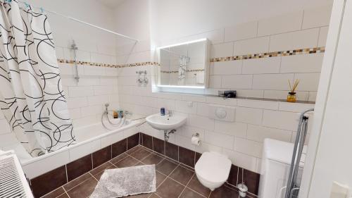 Foto SweetHome - Business-Apartment mit Küche, Terrasse, Stellplatz 6