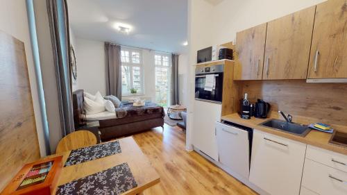 Foto SweetHome - Business-Apartment mit Küche, Terrasse, Stellplatz 3