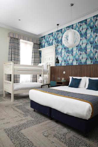 Cairn Hotel & Apartmentsにあるベッド