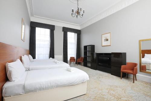Cairn Hotel & Apartmentsにあるベッド