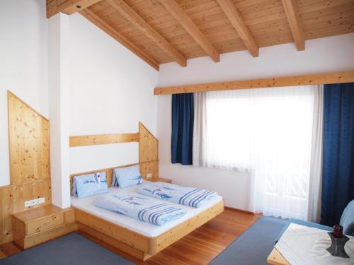 Postel nebo postele na pokoji v ubytování Appart Gabl
