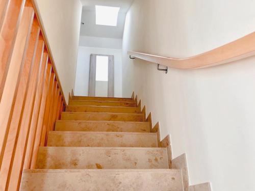 a staircase in a building with a stair case at PerlePlau in Plau am See