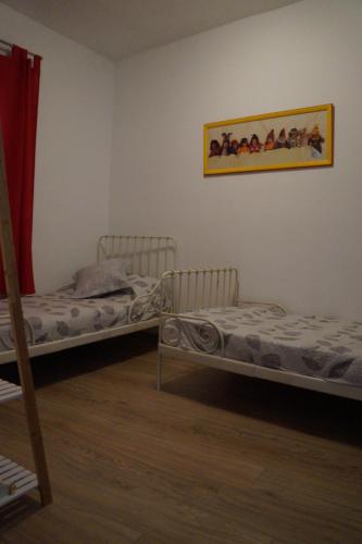2 camas en una habitación con en Casa Teide, en La Orotava