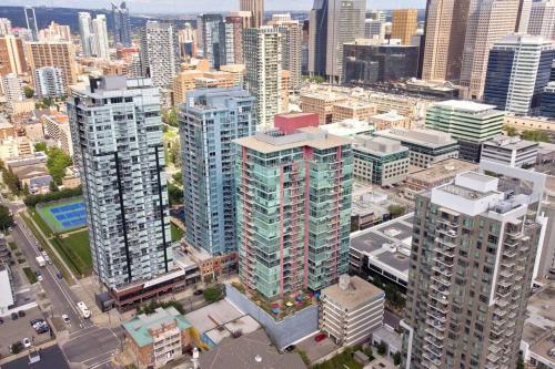 an aerial view of a city with tall buildings at Stylish 1BR, Stampede & Free Parking by Doorbed in Calgary