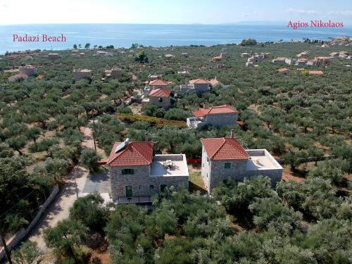 an aerial view of a house in a field at Mani Cosy View Maisonette in Riglia