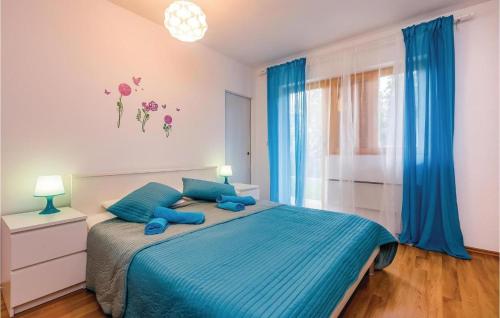 Postel nebo postele na pokoji v ubytování Apartman Luce