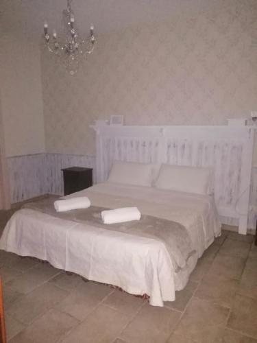 Ένα ή περισσότερα κρεβάτια σε δωμάτιο στο EneaHouse