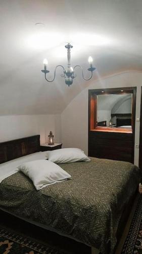 Ένα ή περισσότερα κρεβάτια σε δωμάτιο στο Ξενώνας Άνθεμις