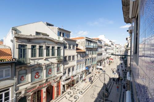 a view of a city street with buildings at Travel & Live Nature in Porto