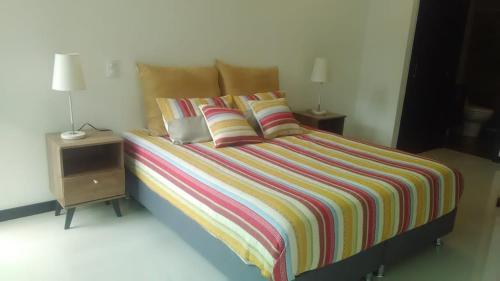 Cama o camas de una habitación en Acogedor apartaestudio, en el mejor sector