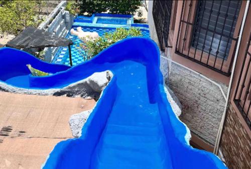 uno scivolo in un parco acquatico di Casa Real Cozumel a Cozumel