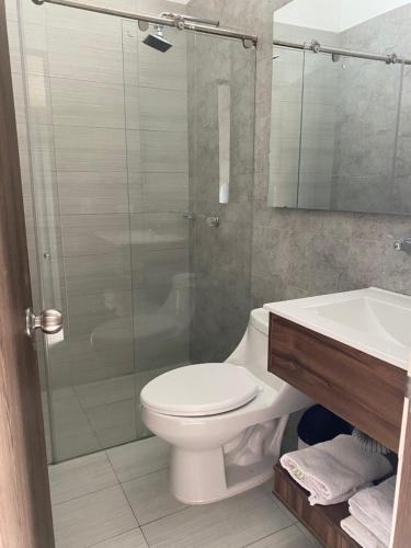Koupelna v ubytování HOTEL MELGAR PLAZA