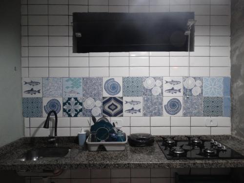 Η κουζίνα ή μικρή κουζίνα στο Guest House Ilha do Mel