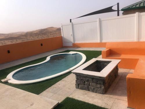 Bazén v ubytování Desert Inn Resort and Camp nebo v jeho okolí