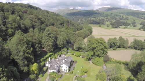 an aerial view of a large house in the hills at Foxghyll Country House in Ambleside