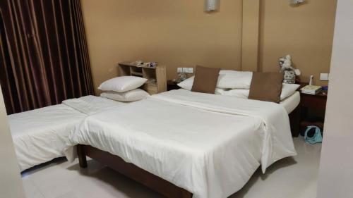 Ein Bett oder Betten in einem Zimmer der Unterkunft ilaa Beach Maldives