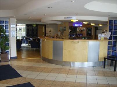 a large room with a large counter and a large window at Diamond Lodge in Manchester