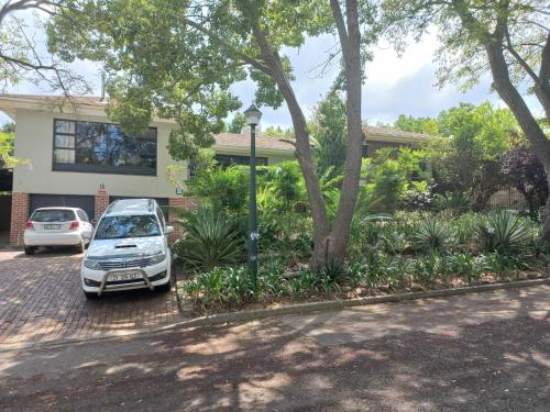 a car parked in front of a house at Lucano 1 Stellenbosch in Stellenbosch