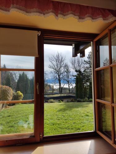 an open window with a view of a field at Apartment Ad Alta - Matschiedl 1 in Hermagor