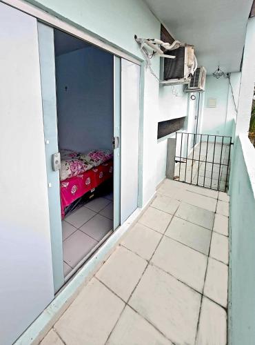 Postel nebo postele na pokoji v ubytování Residencial Dom Álec S3
