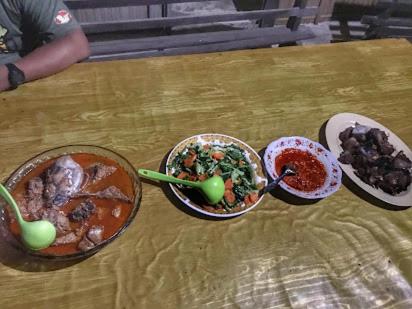 a table with three bowls of food on it at Arborek Diving Homestay R4 in Besir