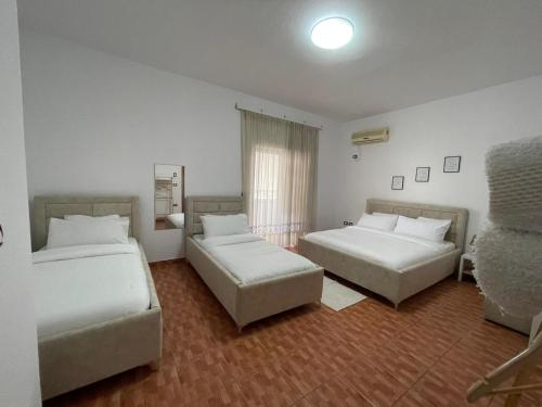 Llit o llits en una habitació de Villa Oasis