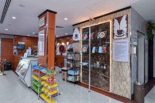 a grocery store with a counter in a store at Aseel Alsharq Serviced Apartments - اقتصادي in Riyadh