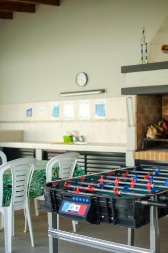 a ping pong table in the middle of a kitchen at JAK Colón in Colón