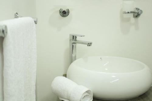 Ένα μπάνιο στο Apartahotel Kelly