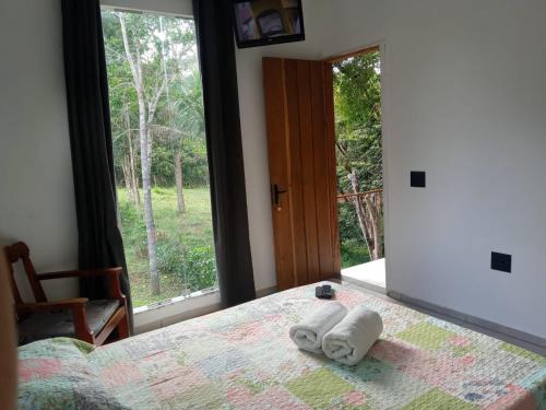 Ένα ή περισσότερα κρεβάτια σε δωμάτιο στο Loft na Mata