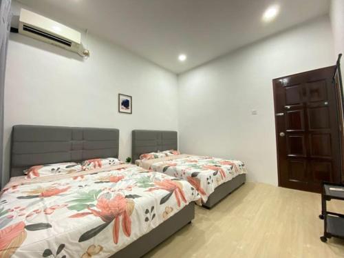 Cama ou camas em um quarto em Home in Johor Bahru
