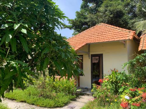 Ein Garten an der Unterkunft Sun & Wind Paradise Bungalow